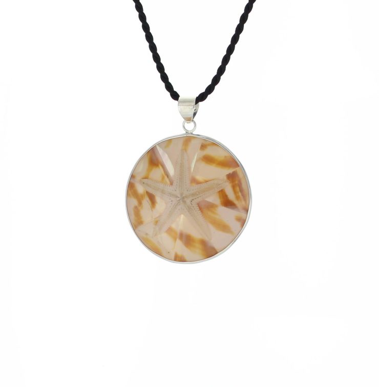 A photo of the Starfish over White and Tan Shell Pendant product