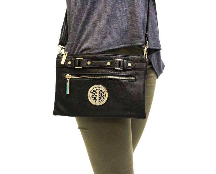 A photo of the Medallion and Buckle Shoulder Bag product