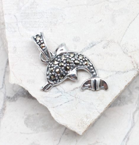 A photo of the The Dancing Dolphin Pendant product