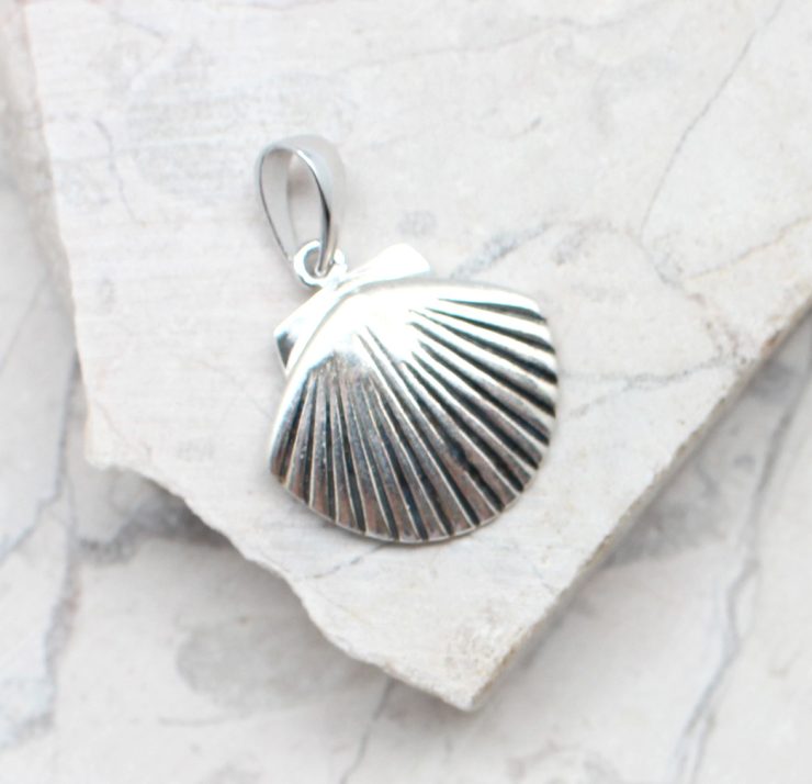 A photo of the The Little Shell Pendant product