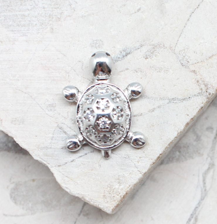 A photo of the The Little Turtle Pendant product