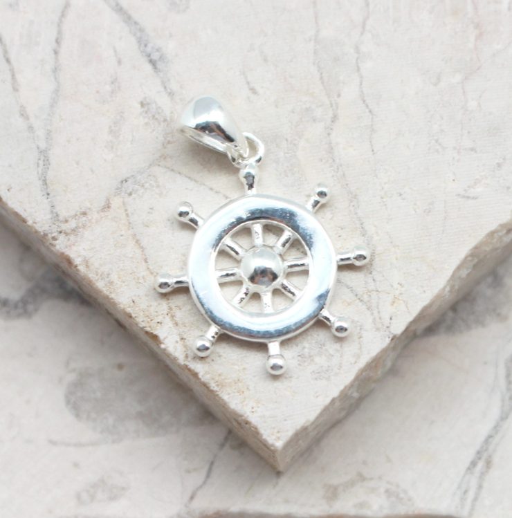 A photo of the The Ship Wheel Pendant product