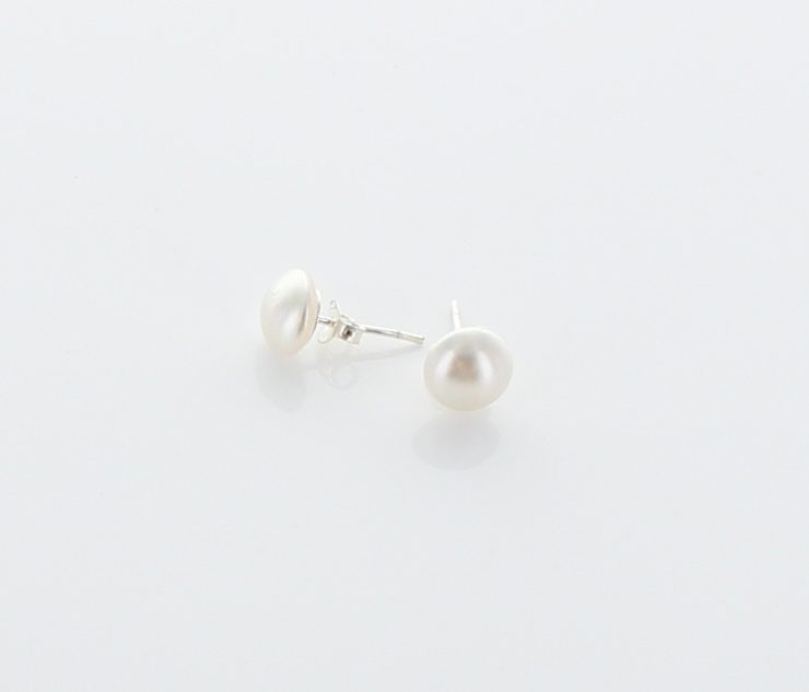 A photo of the Sterling Silver Pearl Stud Earrings product