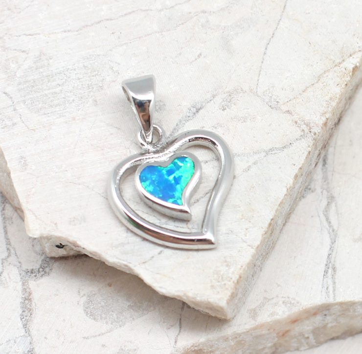 A photo of the The Opal Heart Pendant product