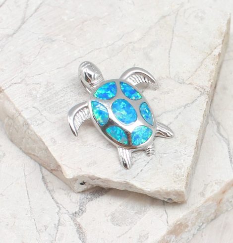 A photo of the The Opal Turtle Pendant product