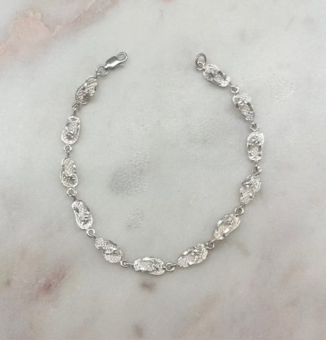 A photo of the Sterling Silver Flip Flop Bracelet product