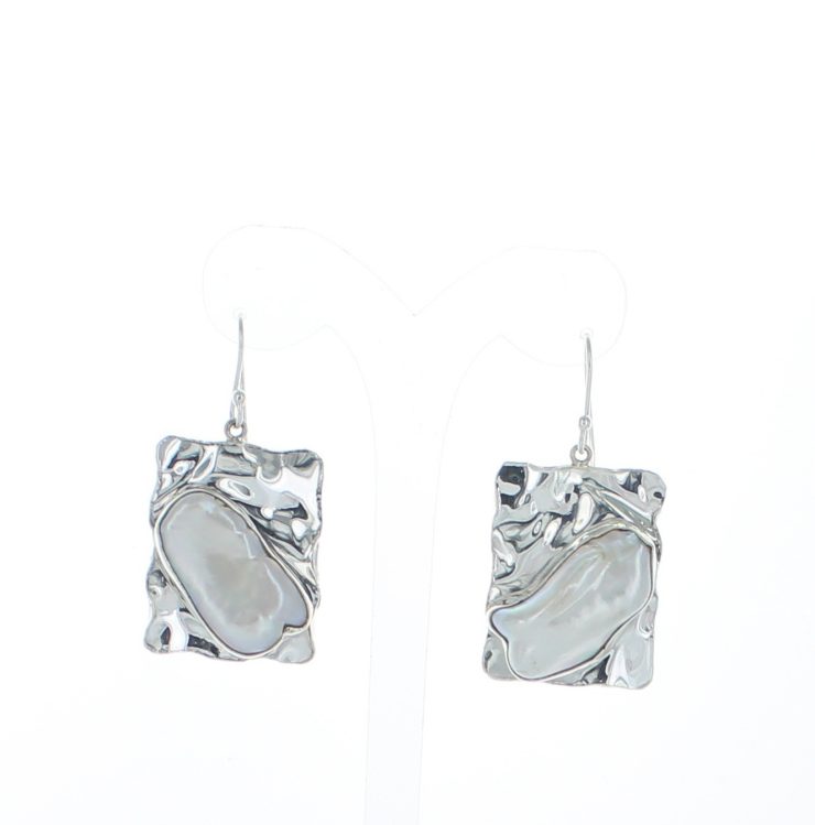 A photo of the Sterling Silver Mother of Pearl Earrings product