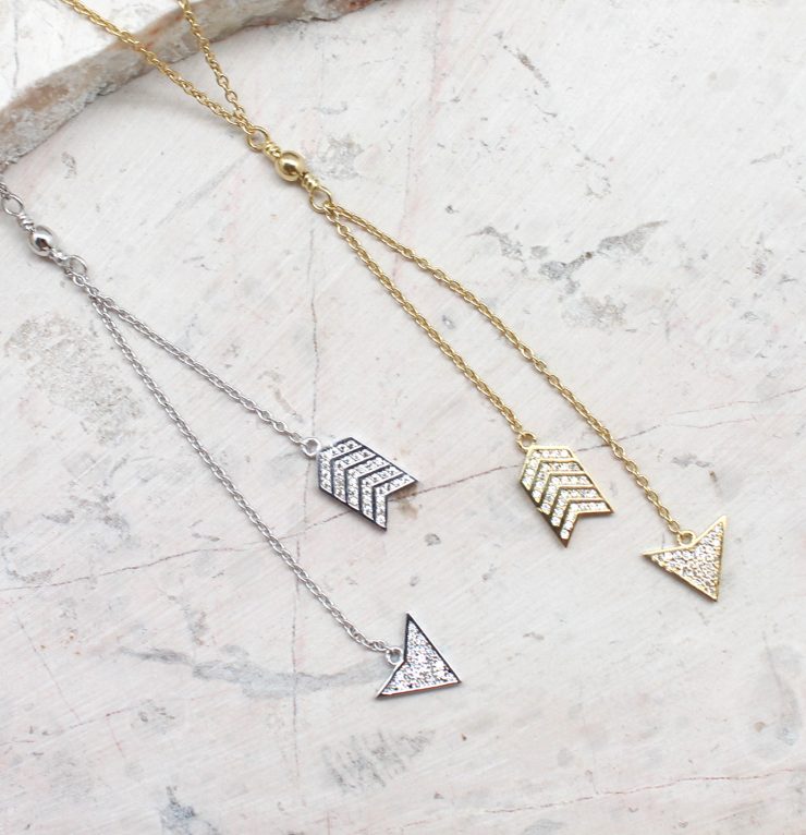 A photo of the Arrow Head and Tail Necklace product