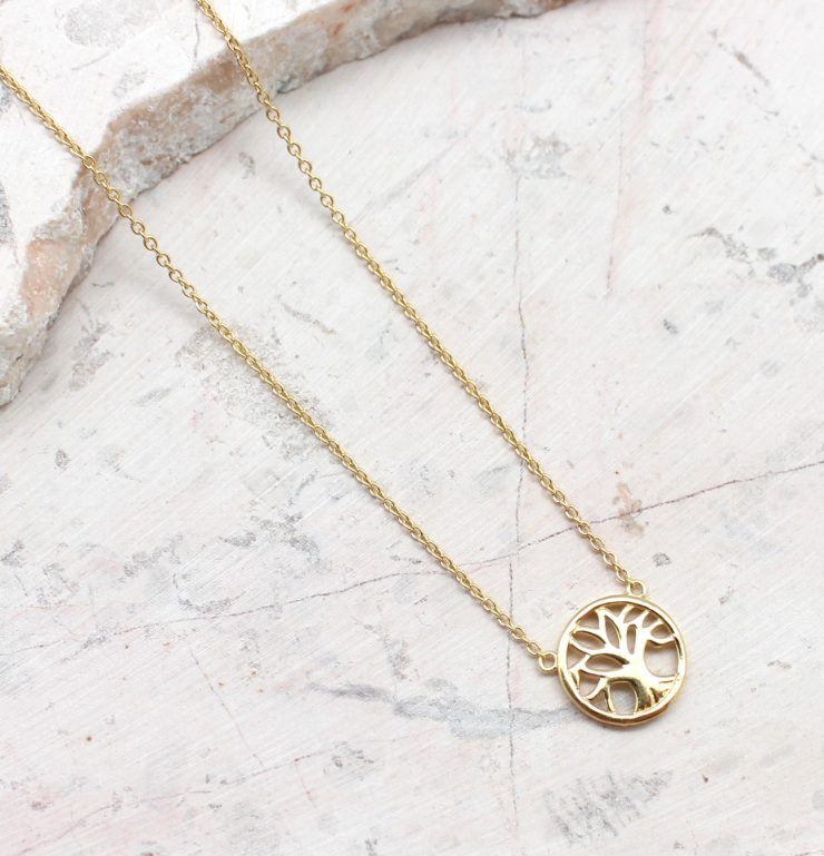 A photo of the Little Tree Of Life Necklace product