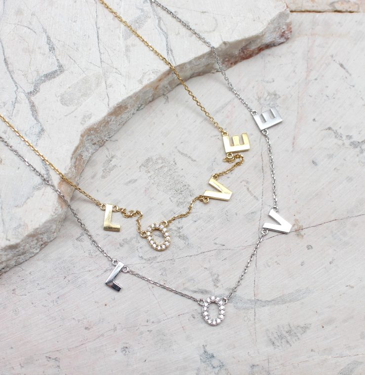 A photo of the Spell It Out Necklace product