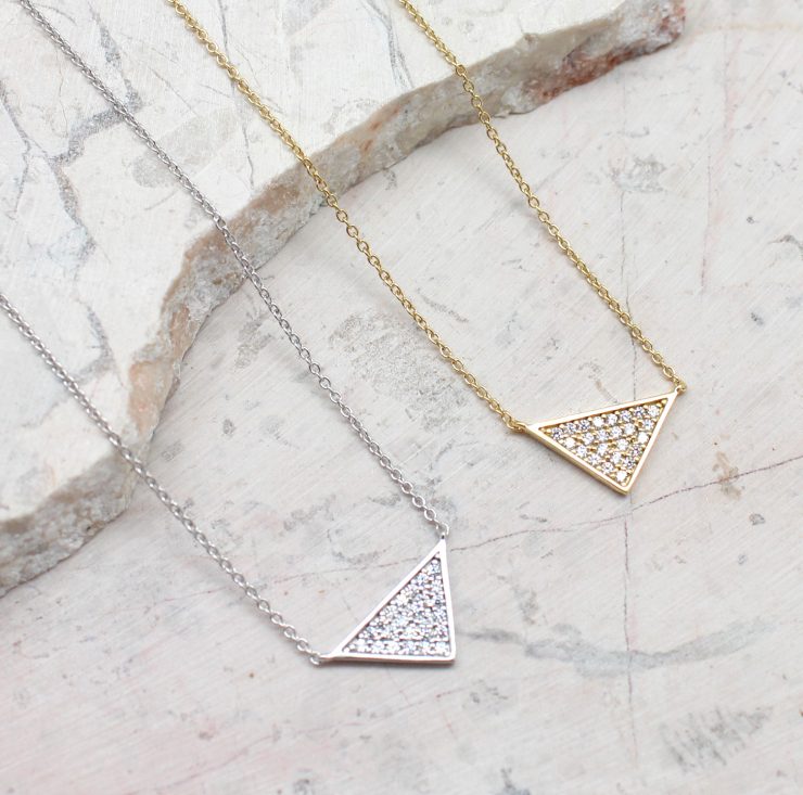 A photo of the Tiny Triangles Necklace product