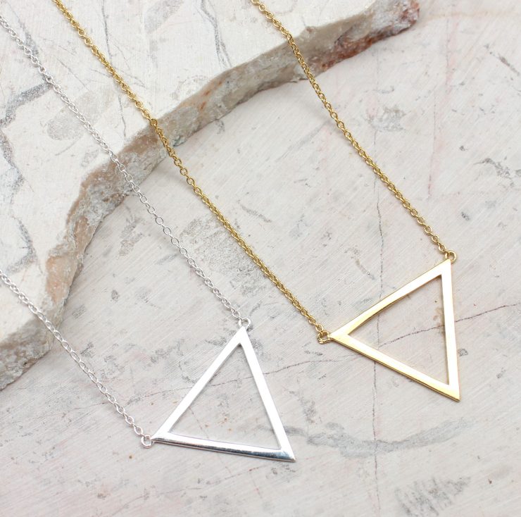 A photo of the Triangle Cut Out Necklace product