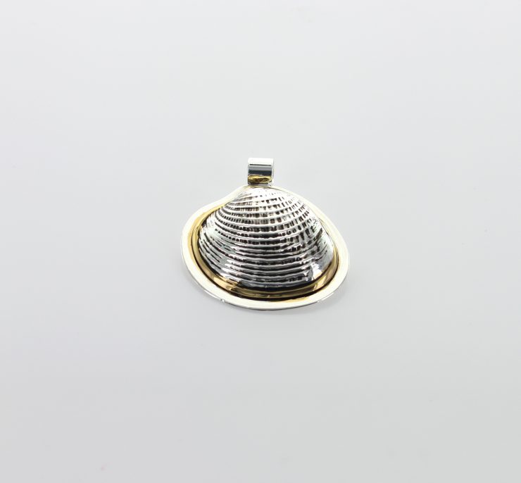 A photo of the Scallop Shell Pendant  product