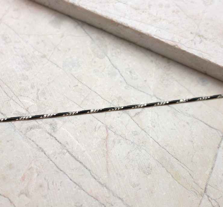 A photo of the Sterling Silver Arrow Bracelet product