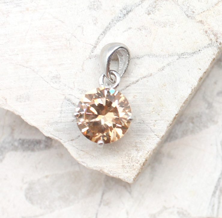 A photo of the The Simple Topaz Stone Pendant product