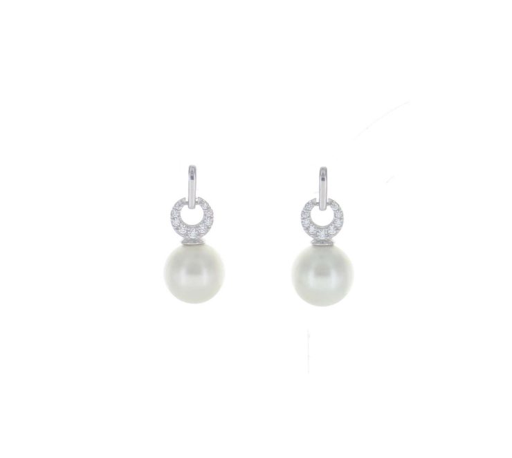 A photo of the Pave & Pearl Post Earrings product
