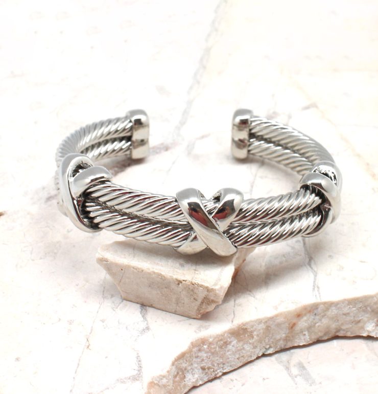 A photo of the Silver X Cuff Bracelet product