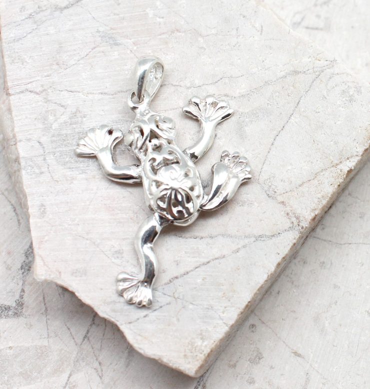 A photo of the The Dancing Frog Pendant product