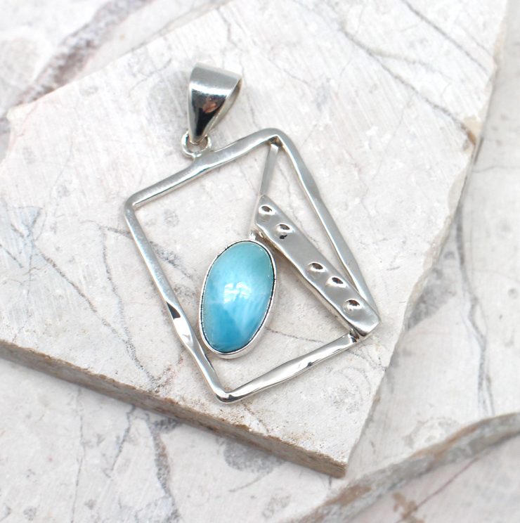 A photo of the The Larimar Rectangle Pendant product