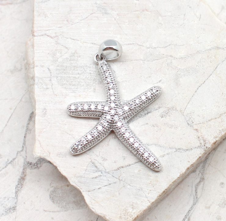 A photo of the The Sea Star Sparkle Pendant product