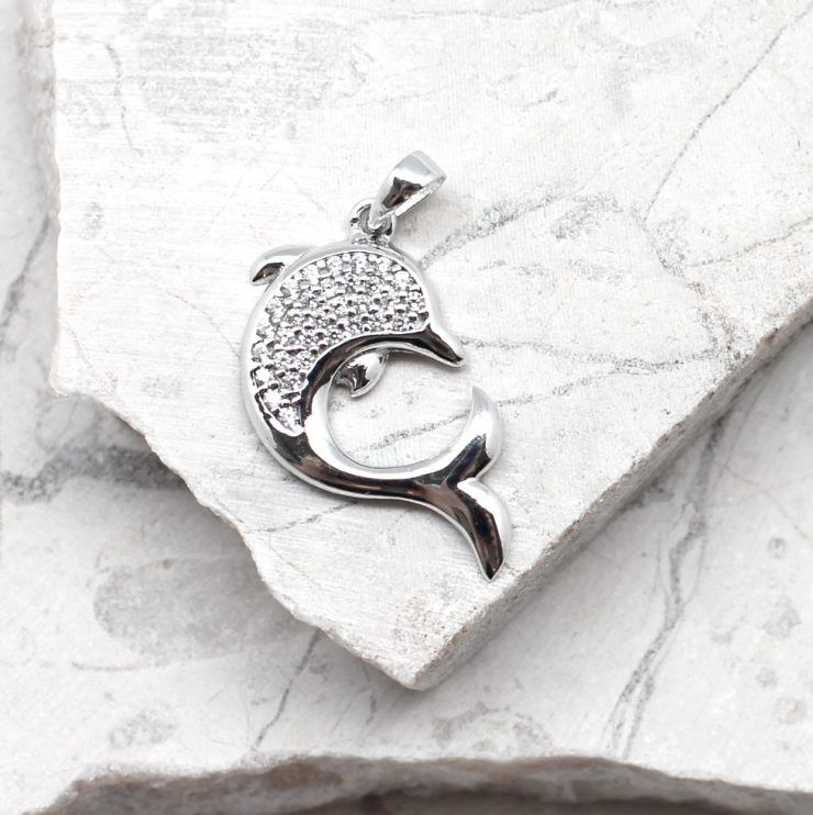 A photo of the The Sparkle Dolphin Pendant product