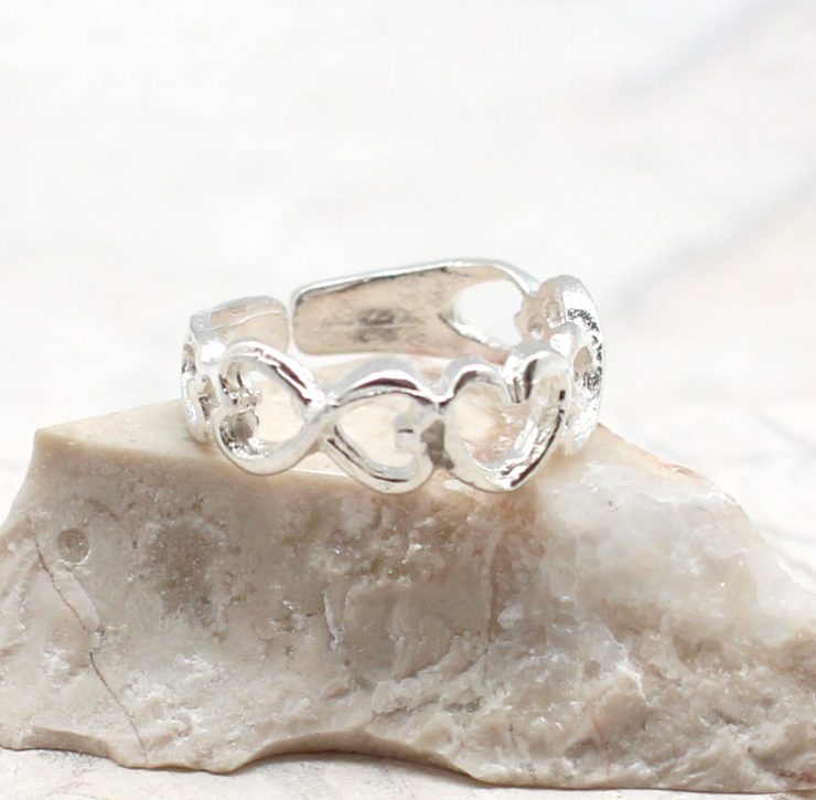 A photo of the The Heart Toe Ring product