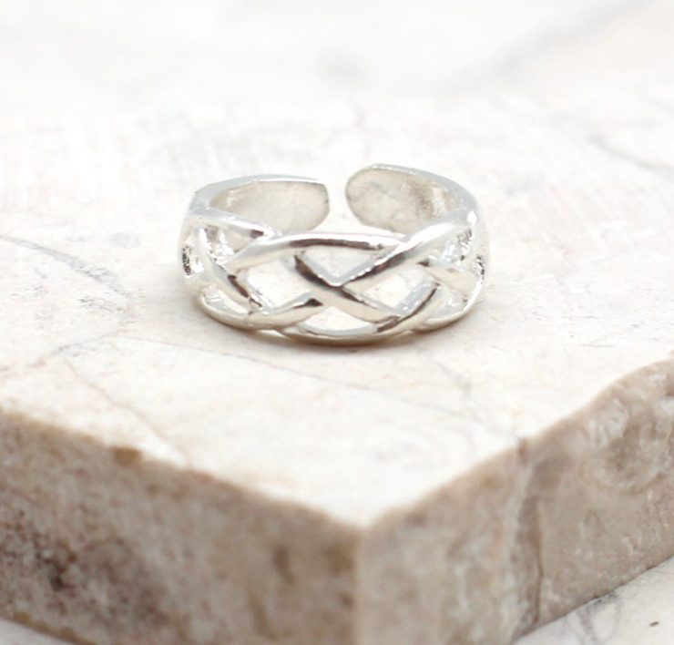 A photo of the The Intertwined Toe Ring product