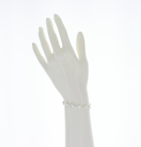 A photo of the Small Scallop Shell Sterling Silver Bracelet product