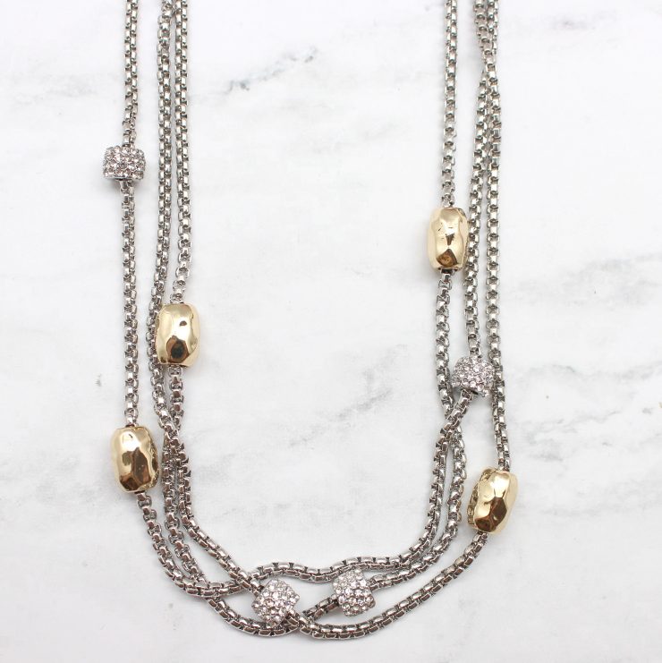 A photo of the Gold & Rhinestones Beads Necklace product
