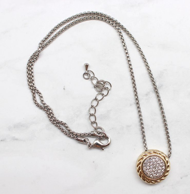 A photo of the Two Tone Dial Necklace product