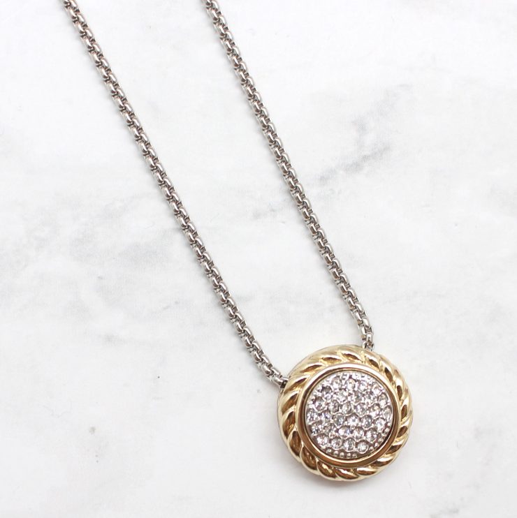 A photo of the Two Tone Dial Necklace product