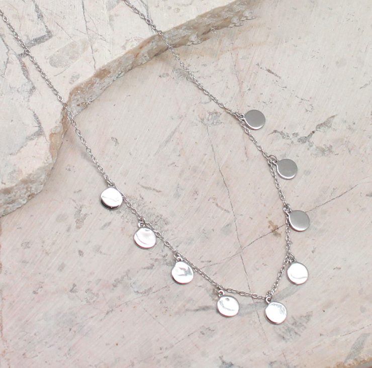 A photo of the Dangling Coins Necklace product