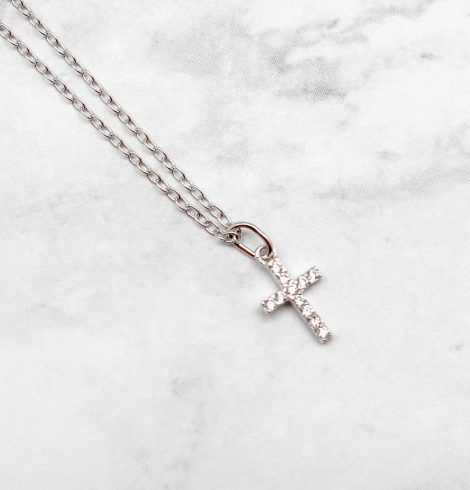 A photo of the Dainty Little Cross Necklace product