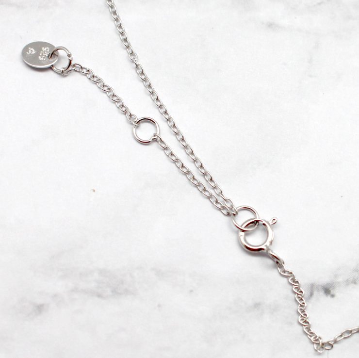 A photo of the Dainty Little Cross Necklace product