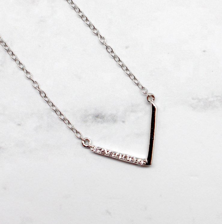 A photo of the The Follow Me Necklace product