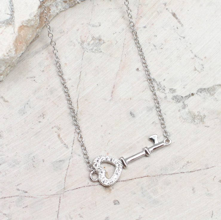 A photo of the The Key Necklace product