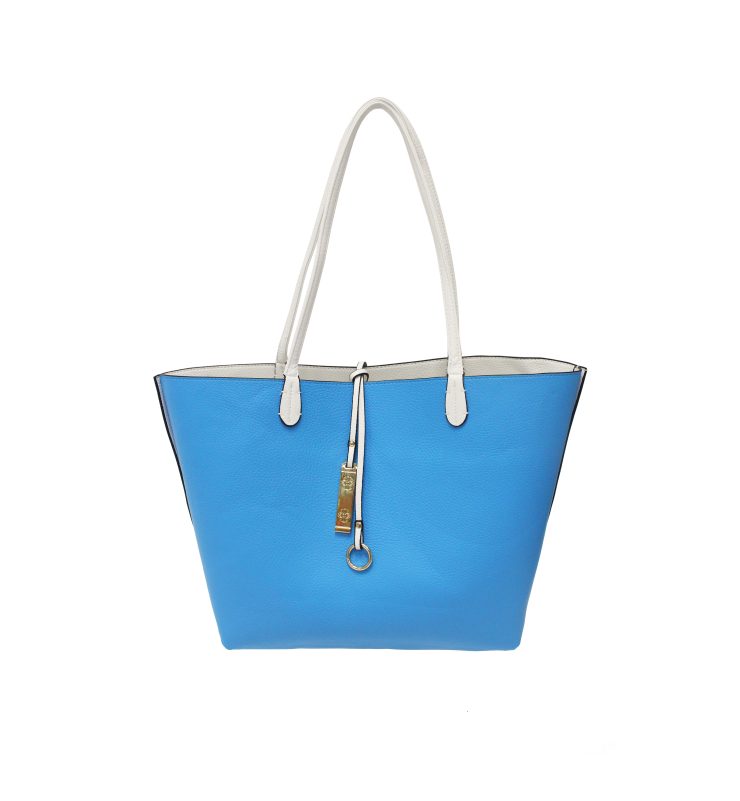 A photo of the Turquoise & White Reversible Tote product
