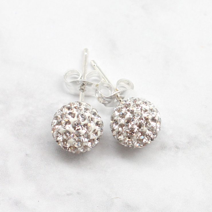 A photo of the White Fireball Studs product