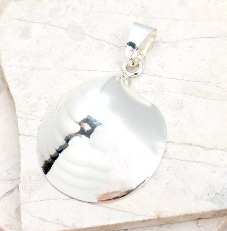 A photo of the Plain Silver Shell Pendant product