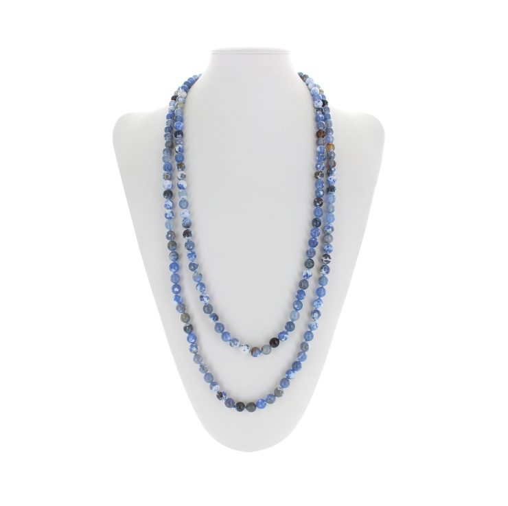A photo of the Blue Crystals & Stones Tassel Necklace product