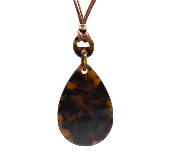 A photo of the Long Tortoiseshell Drop Necklace product