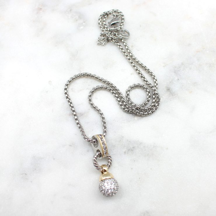 A photo of the Fire Ball Drop Necklace product