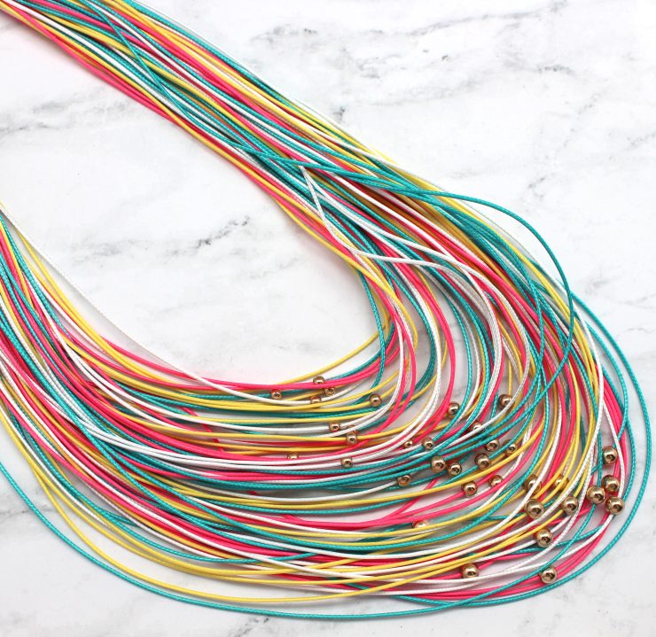 A photo of the Long Rainbow Strings Necklace product