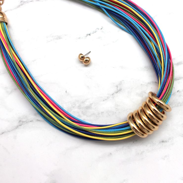 A photo of the Rainbow Strings Gold Ring Necklace product
