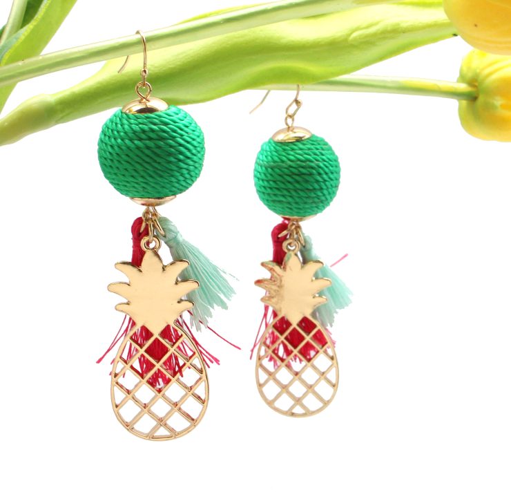 A photo of the Pineapple Charm Earrings product