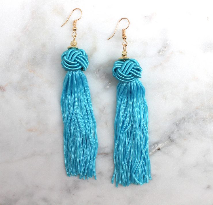 A photo of the Love Knot Earrings product