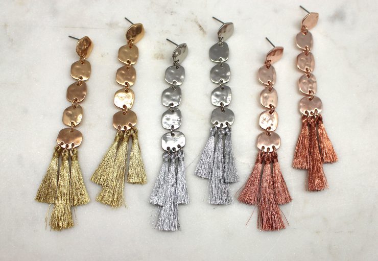 A photo of the Aztec Dangle Tassel Earrings product