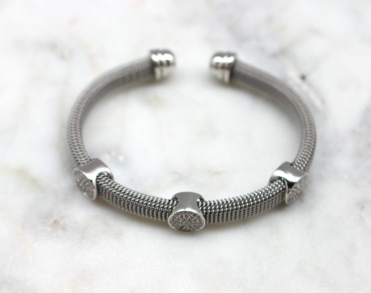 A photo of the Rhinestone Circles Cuff Bracelet product