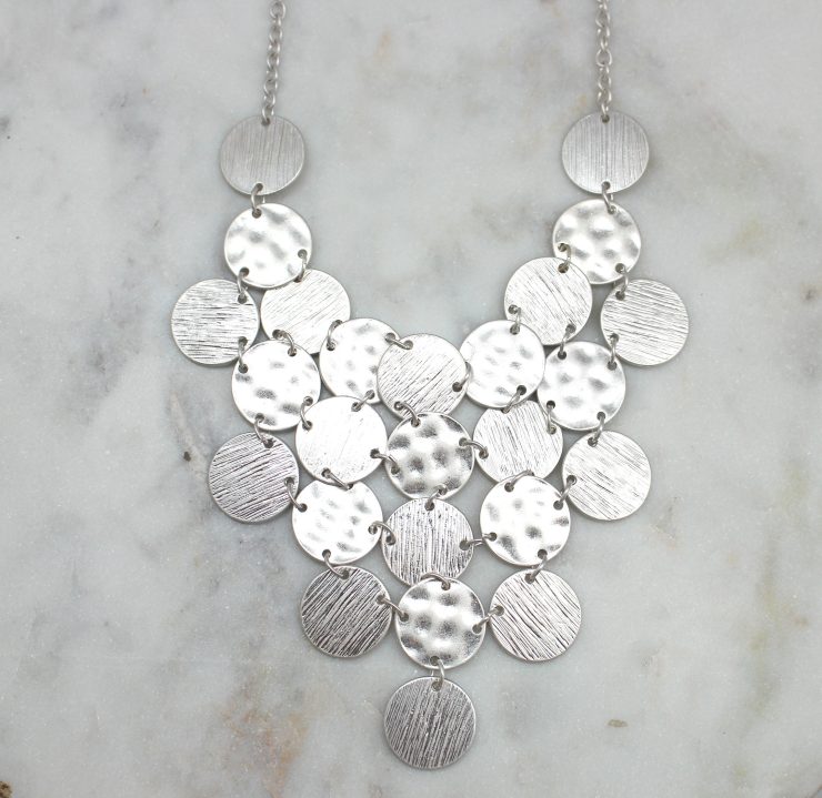 A photo of the Flip A Coin Necklace product