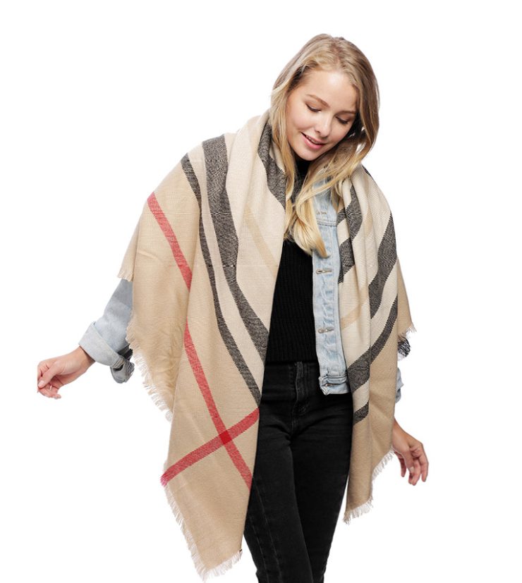 A photo of the Pretty In Plaid Beige Scarf product
